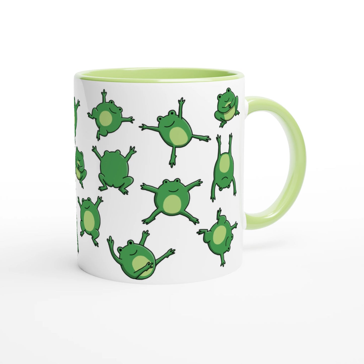 Astral Apple dish washer safe, microwave safe ceramic coffee mug in White and Green, with graphic print of lots of cute, smiling, cartoon style frogs , back view, for the person who loves frogs