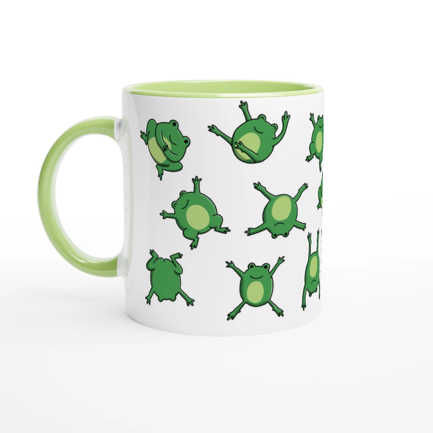 Astral Apple dish washer safe, microwave safe ceramic coffee mug in White and Green, with graphic print of lots of cute, smiling, cartoon style frogs , front view, for the person who loves frogs