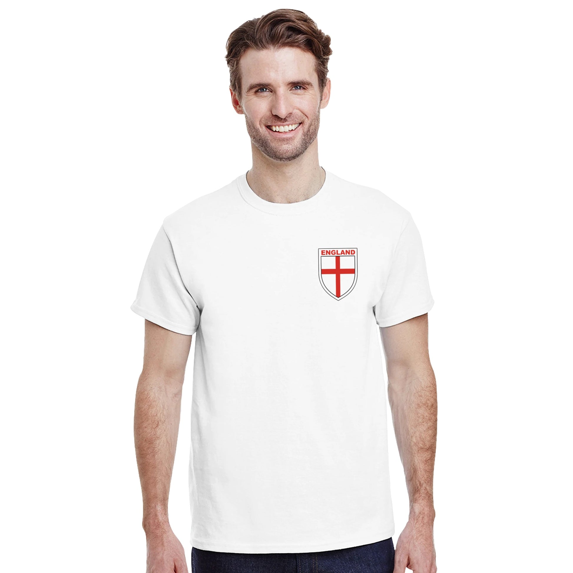 A white England football t-shirt with a shield with the red cross of St. George printed in the top corner. Worn by a man