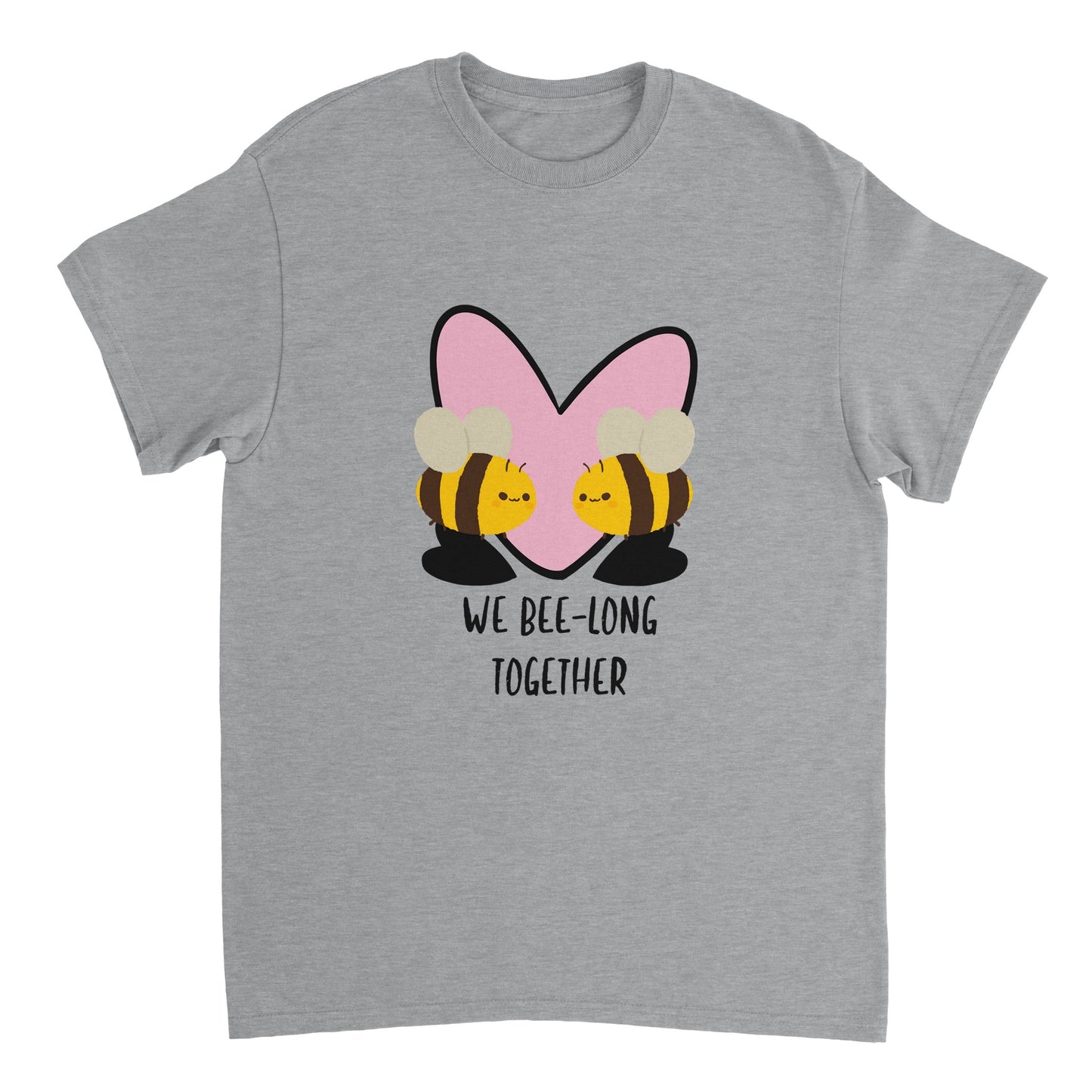 A light grey t shirt with black text saying, "We bee-long together" and an image of a pink heart behind two bees facing each other.