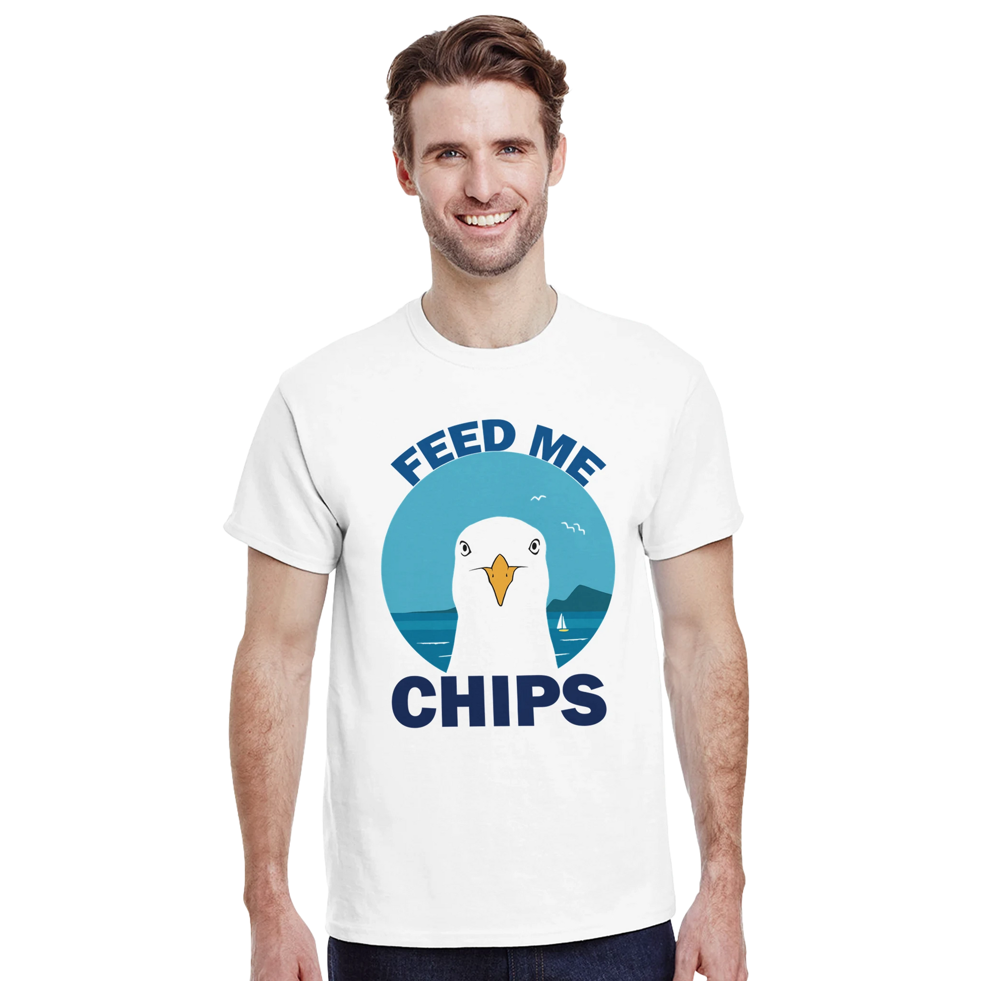 Astral Apple Men’s, Women’s or Unisex short sleeved, casual style classic crewneck t-shirt in white cotton, with graphic print of a seagull at the beach and the text, “Feed Me Chips”, on a model, funny beach and seaside design