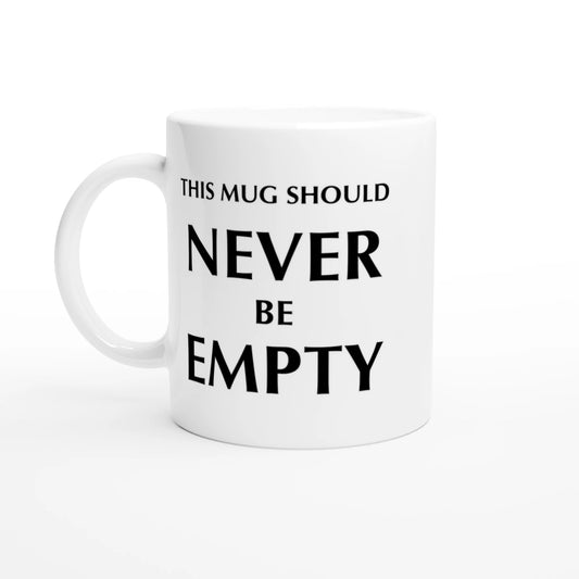 Astral Apple white, microwave and dishwasher safe, 11oz, ceramic mug with graphic print of the text, “This Mug Should Never Be Empty”, front view, funny mug design