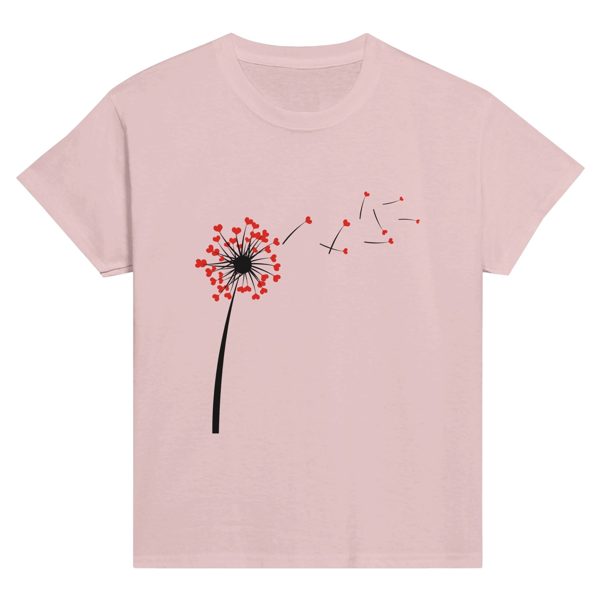 Child's pink t-shirt with heart dandelion seeds being blown into the wind.