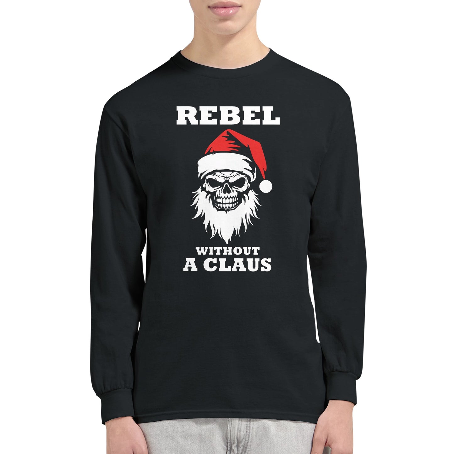 A black, long sleeved shirt with a picture of a bearded skeleton Santa and the text, "Rebel without a Claus", worn by a man.