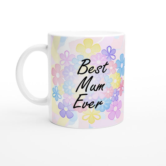 Front view of a white ceramic mug with the words "Best Mum Ever" written on it, with a background of pastel coloured flowers.