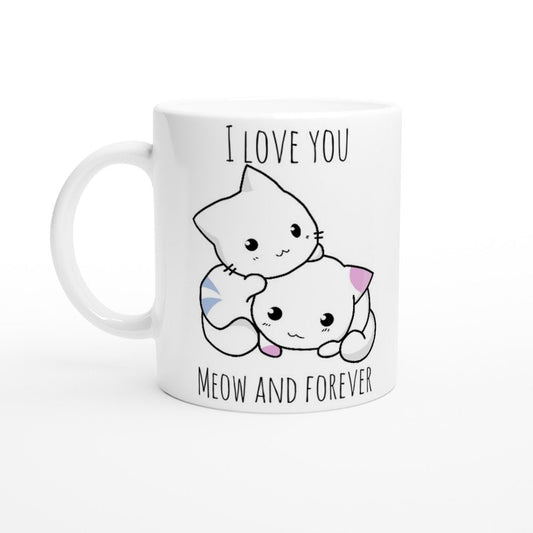 A white ceramic mug with the pun, "I love you meow and forever" and a picture of a blue and white striped cat next to a white and pink spotted cat.